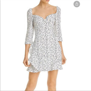 Elegant White and Black Polka Dot Mini Dress